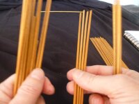 How to use I Ching sticks: Pulling out groups of 4 sticks from left hand to right